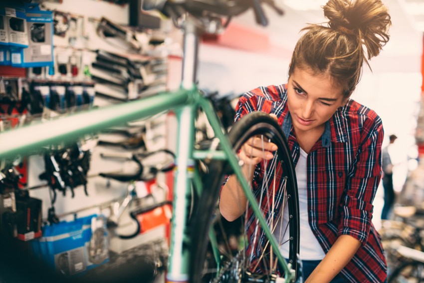 woman working in a bike shop